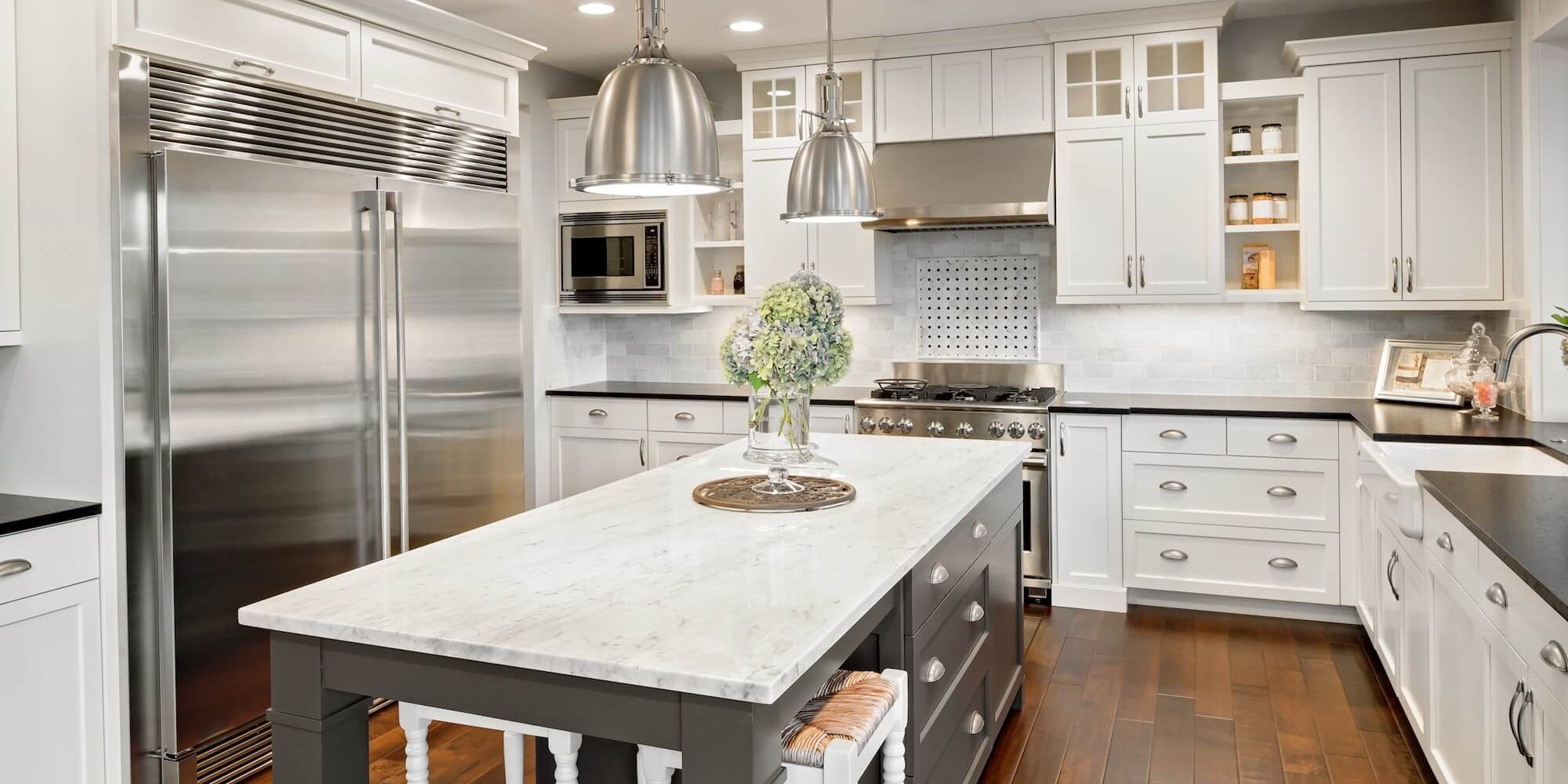 Refinished kitchen cabinets with a smooth sprayed finish in a London, Ontario kitchen