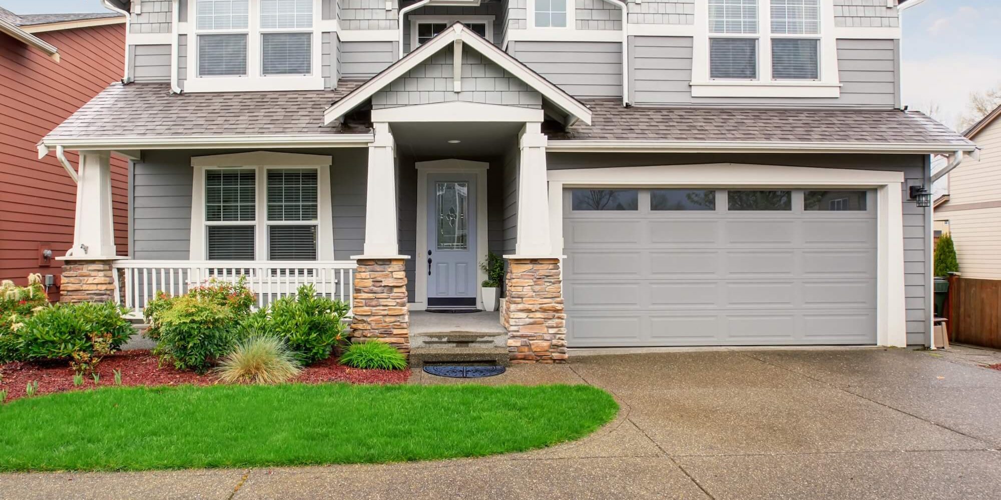 Newly painted exterior with refreshed siding and trim on a London, Ontario home